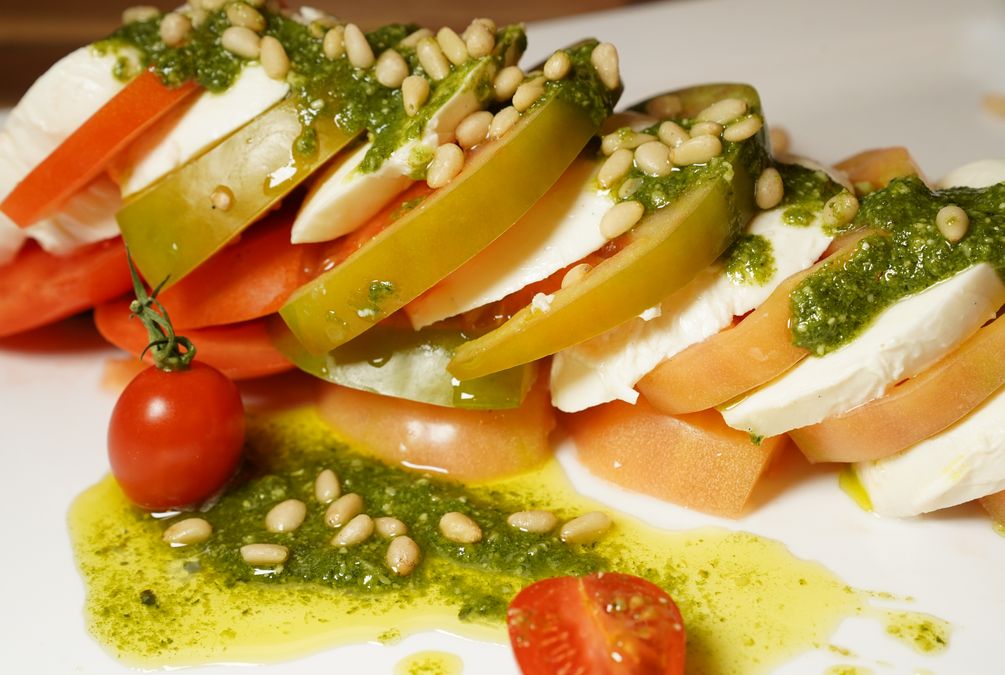 Caprese with house pesto and heirloom tomato